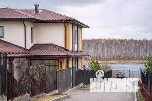 Коттедж 465м², 3-этажный, участок 10 сот.